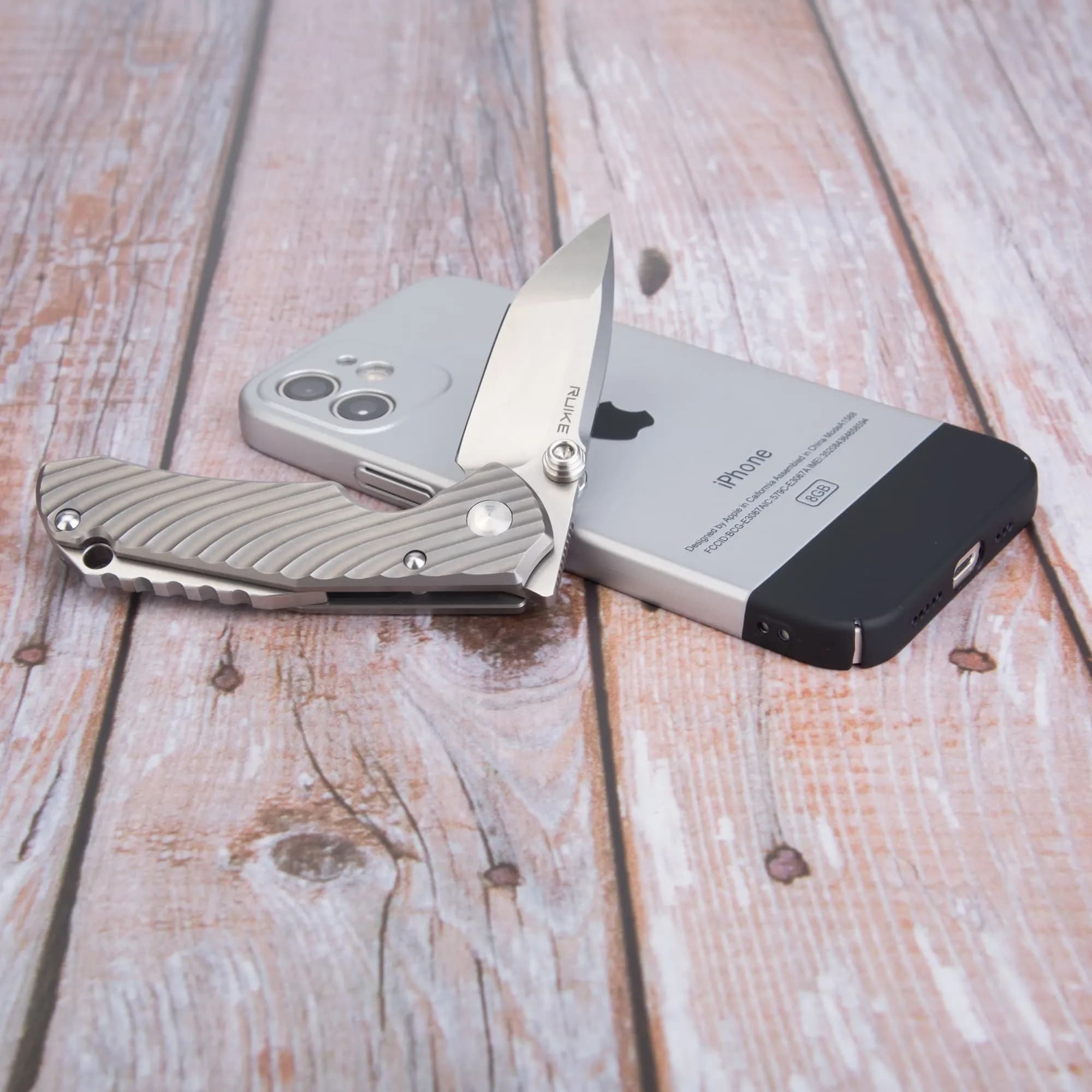 Ніж складаний кишеньковий Ruike M671-TZ, (7 см) steel 154СМ / TC4 (титан) сірий